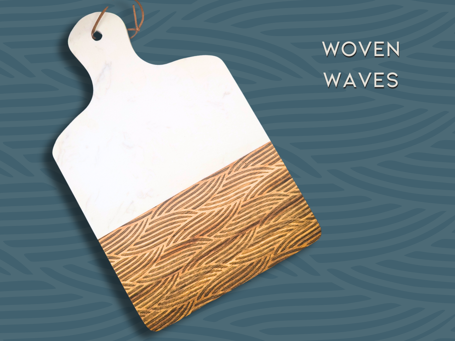 A marble and wooden charcuterie board engraved in the pattern "woven waves". This is an organic pattern with waves composed of six lines.